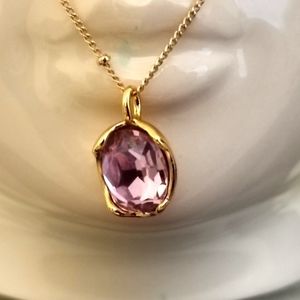 Gold plated purple cubic zirconia necklace